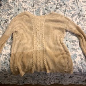 Beige knitted sweater